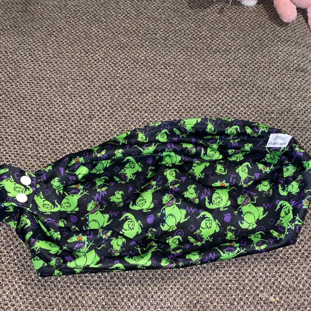 Green and Purple Character Print Fabric